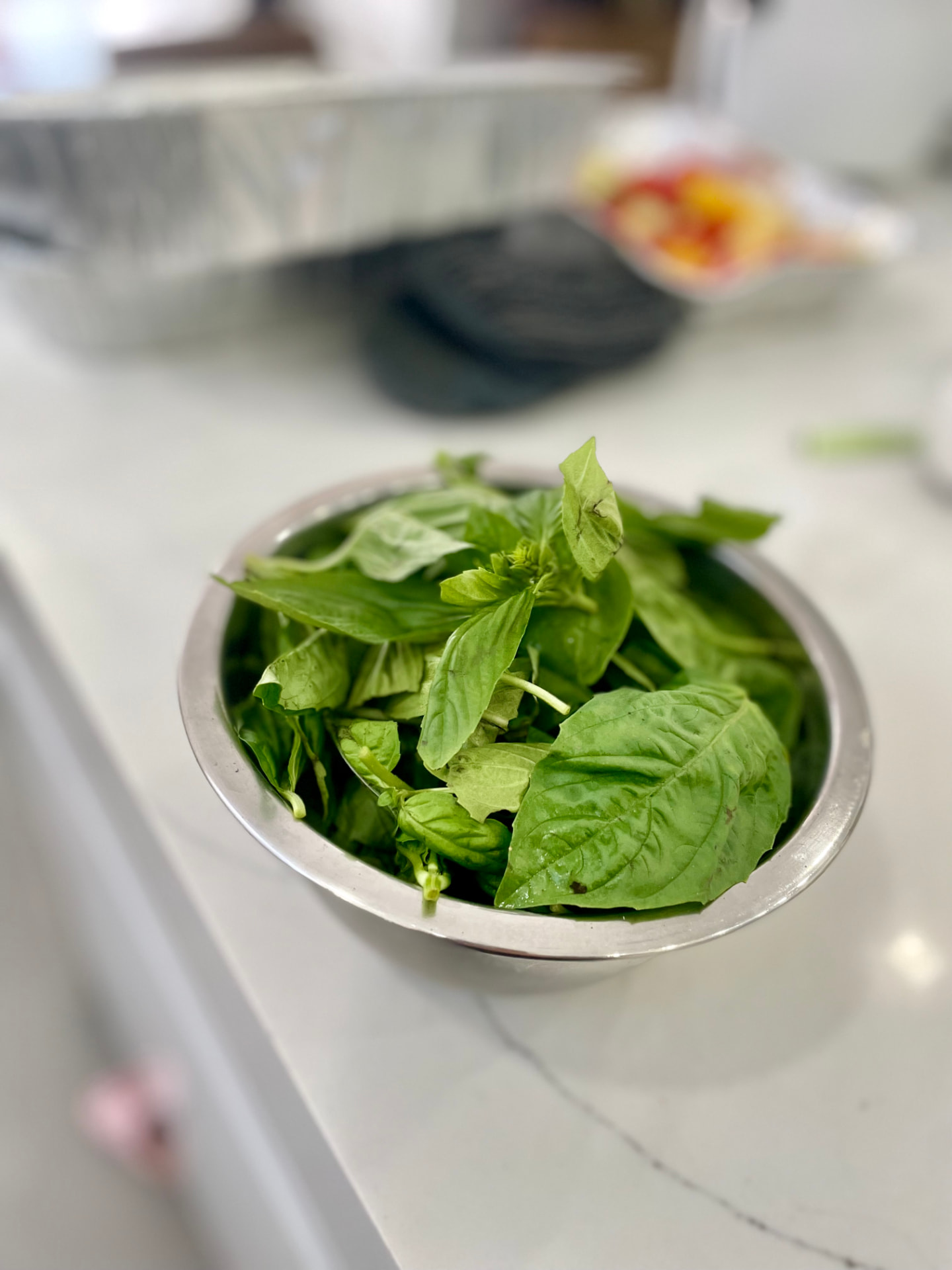 Fresh basil leaves in our kitchen