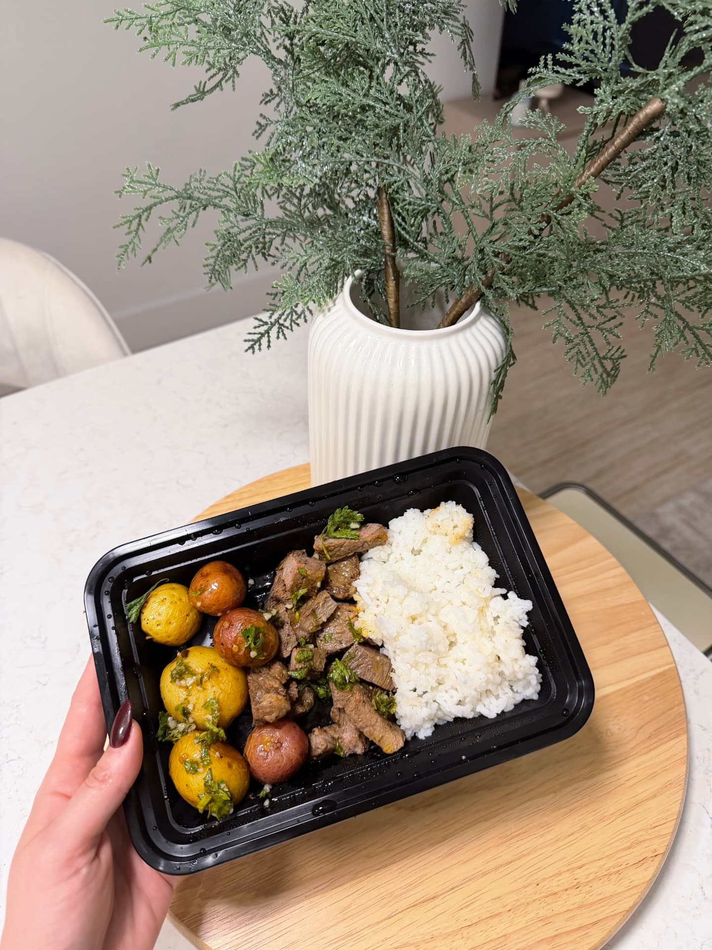Sirloin steak with baby potatoes, chimichurri, and white rice